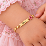 Kids personalised ID Bracelet with hearts and flowers for baby age 6 months - 10 years.  Gold water and tarnish proof stainless steel.
