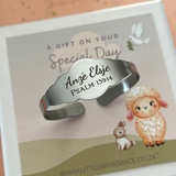 Silver personalized engraved identity baby bangle for infants and toddlers, adjustable size, water and tarnish proof.