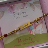 Personalized engraved kids ID bracelet with ruby stone, water and tarnish proof stainless steel, lead and nickel free.
