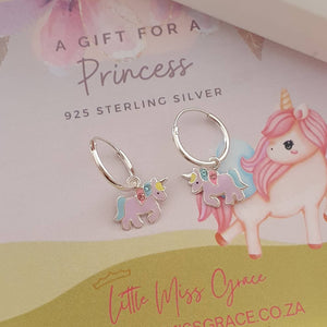 Children's silver hoop earrings with dangle unicorns